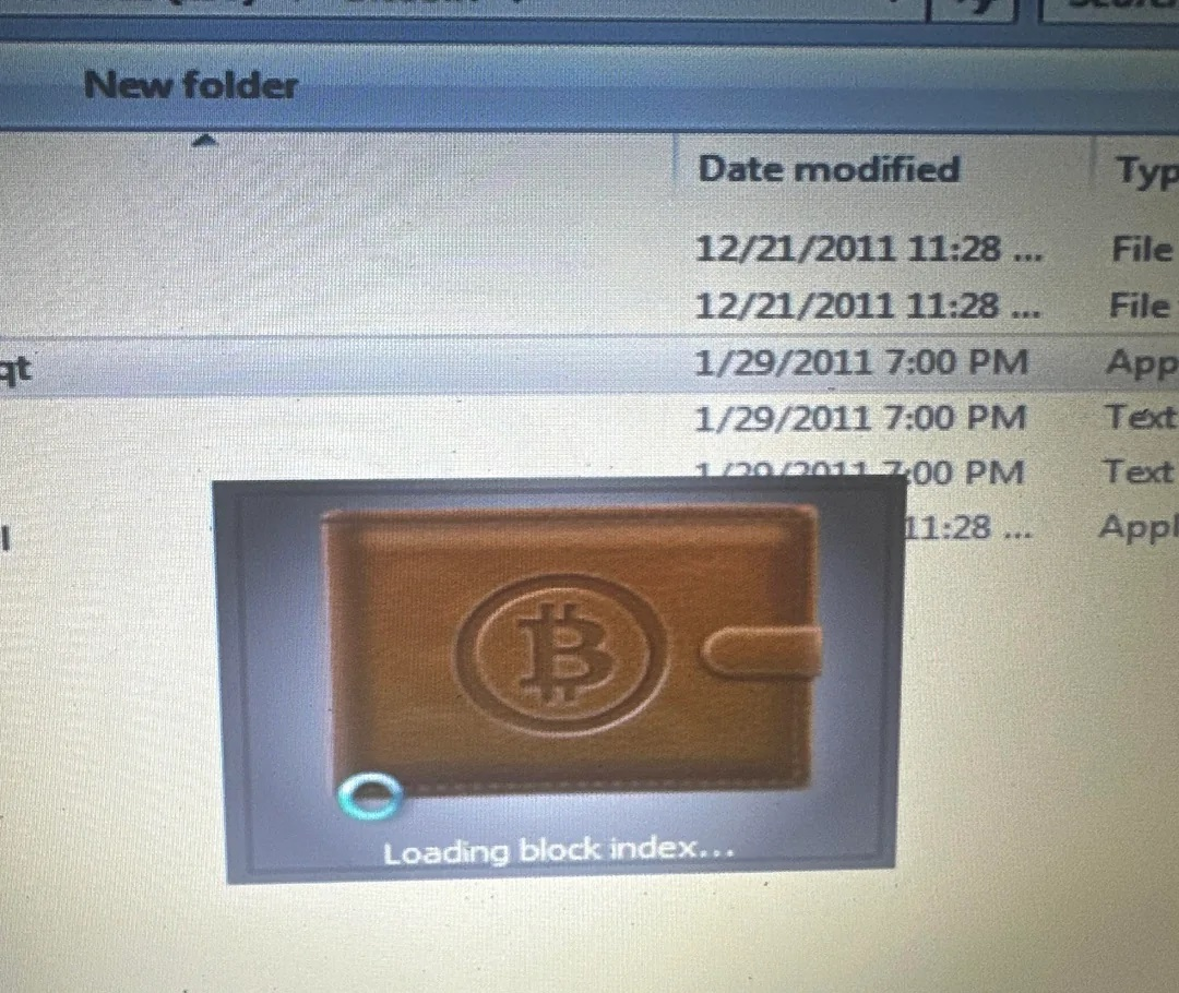 A nostalgic view of an early Bitcoin-Qt wallet interface from January 2011 showing the loading block index message on a Windows desktop.